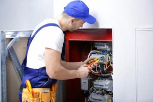 electrician repairing electric panel